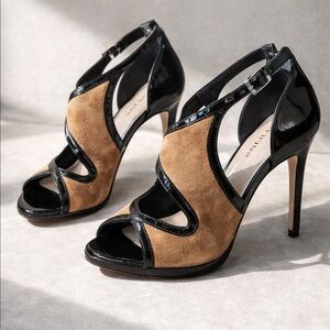 Antonio Melani size 8.5 brown suede and black 4 inch heels with a peep toe.